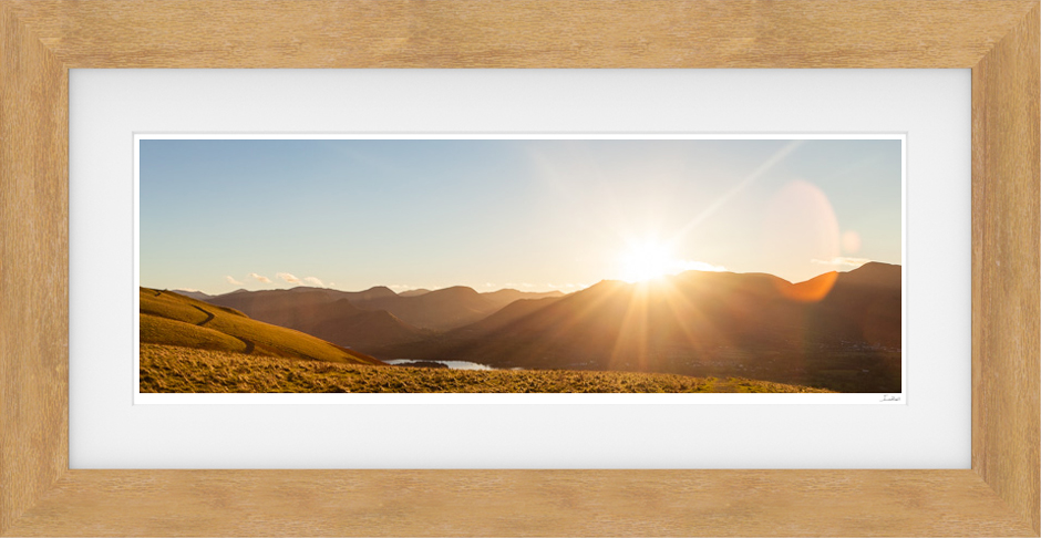 Sunset over Keswick and the surrounding Lake District Fells. Prints available online of this photograph