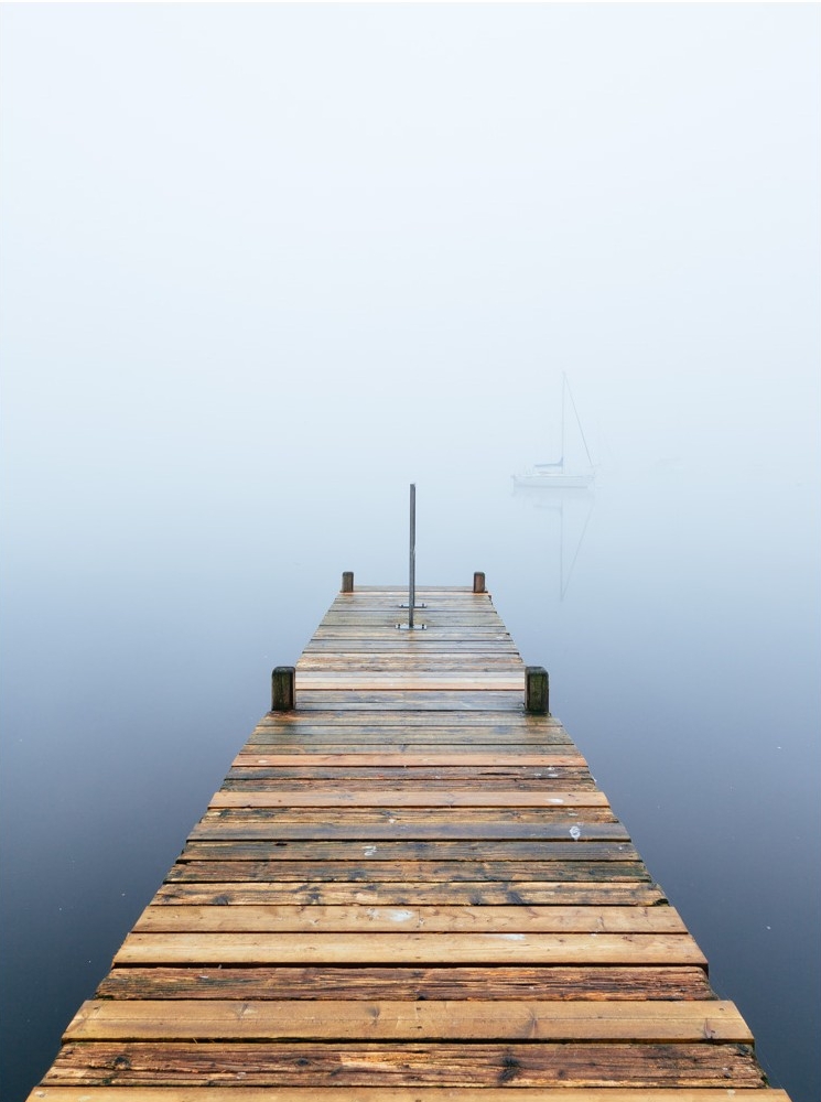 Misty morning at a jetty on Windermere