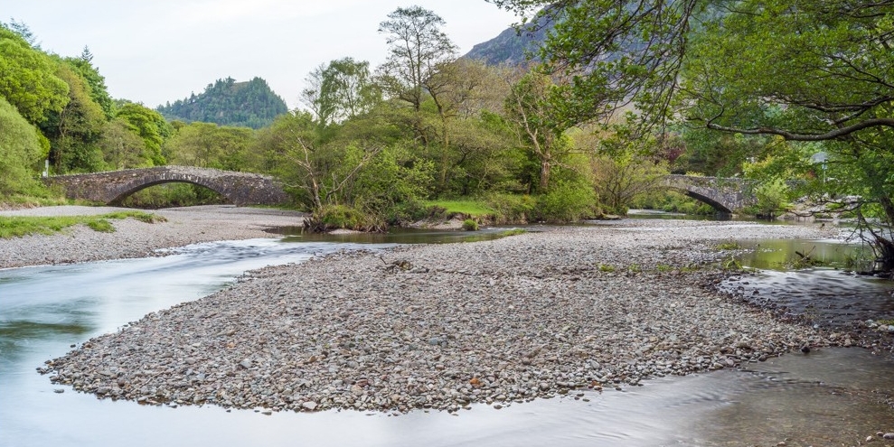 Two bridges and river in Borrowdale in the Lake District